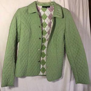 Light green quilted jacket with snap front
